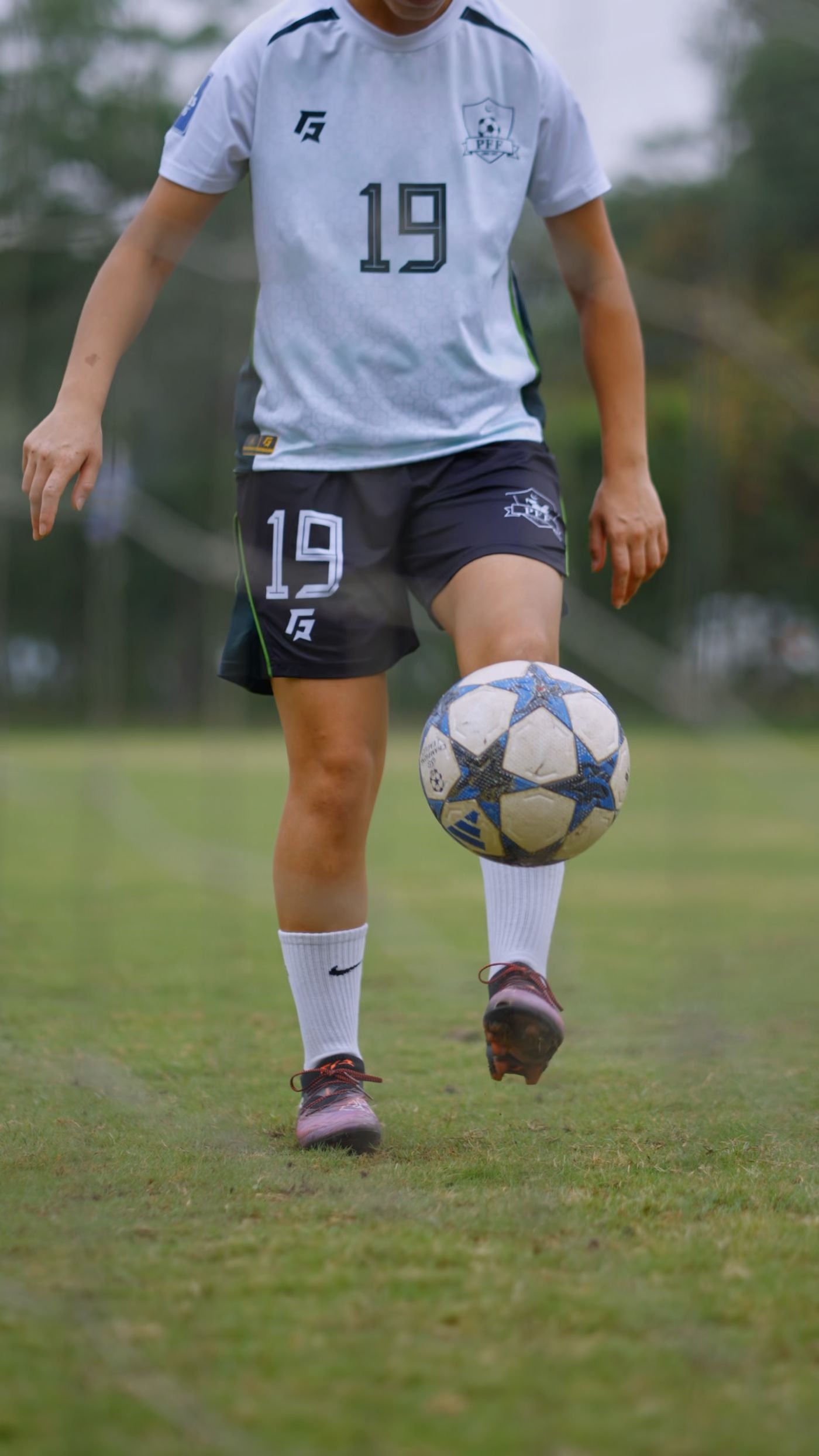 Pakistan Football Federation player juggling a ball during commercial filming