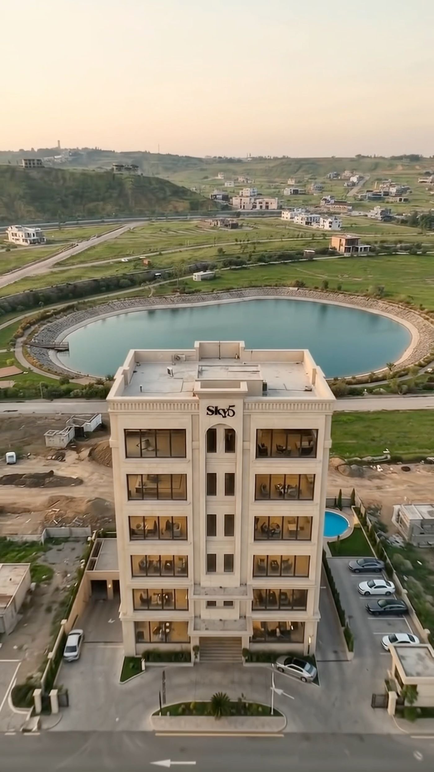 Aerial render of Sky5 DHA Phase 4 beside the lake